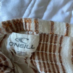 Skirt with slits in front. Worn